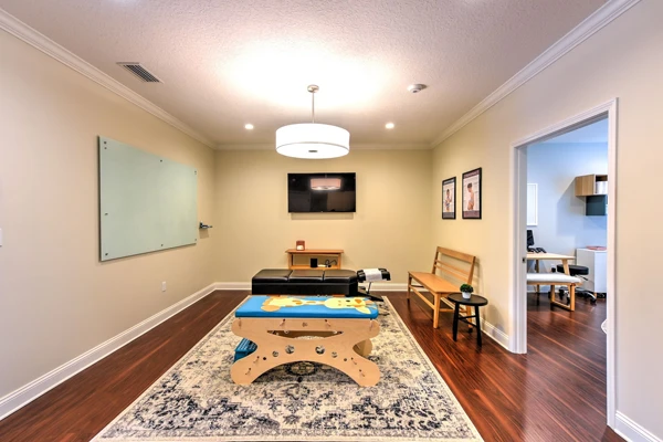 An adjustment room at Life Family Chiropractic with adult and children's adjustment tables