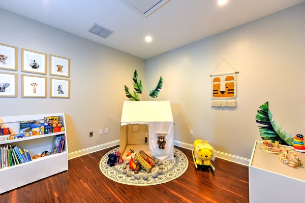 A jungle-themed play room for the pediatric patients at Life Family Chiropractic
